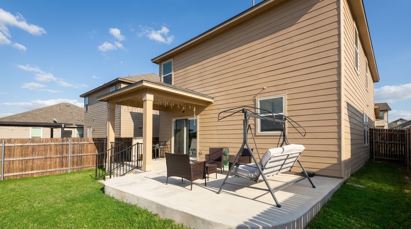 308 Los Cobos Lane Georgetown, TX 78626 - Photo 6 of 31 a view of a house with backyard and sitting area