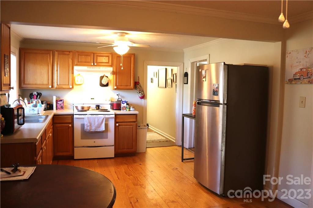 36 Stockton Road Weaverville, NC 28787 - Photo 11 of 31 a kitchen with stainless steel appliances granite countertop a refrigerator and a stove