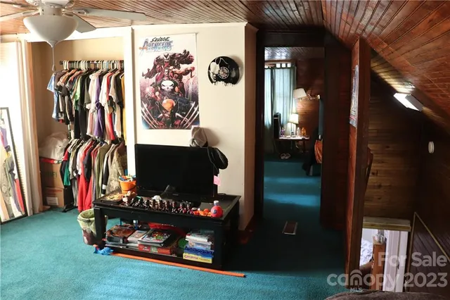 a room with lots of different colored cloths