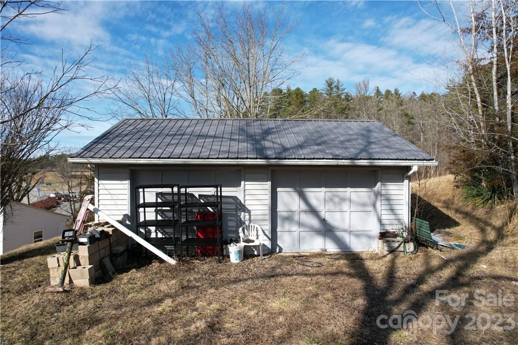 36 Stockton Road Weaverville, NC 28787 - Photo 15 of 31 a view of a house with a yard and garage