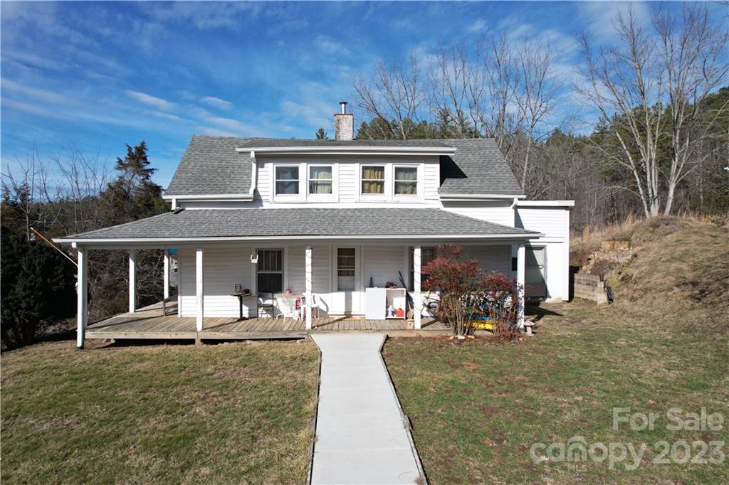 36 Stockton Road Weaverville, NC 28787 - Photo 7 of 31 a front view of house with yard outdoor seating and green space