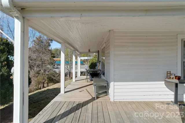 a balcony view with a outdoor seating space