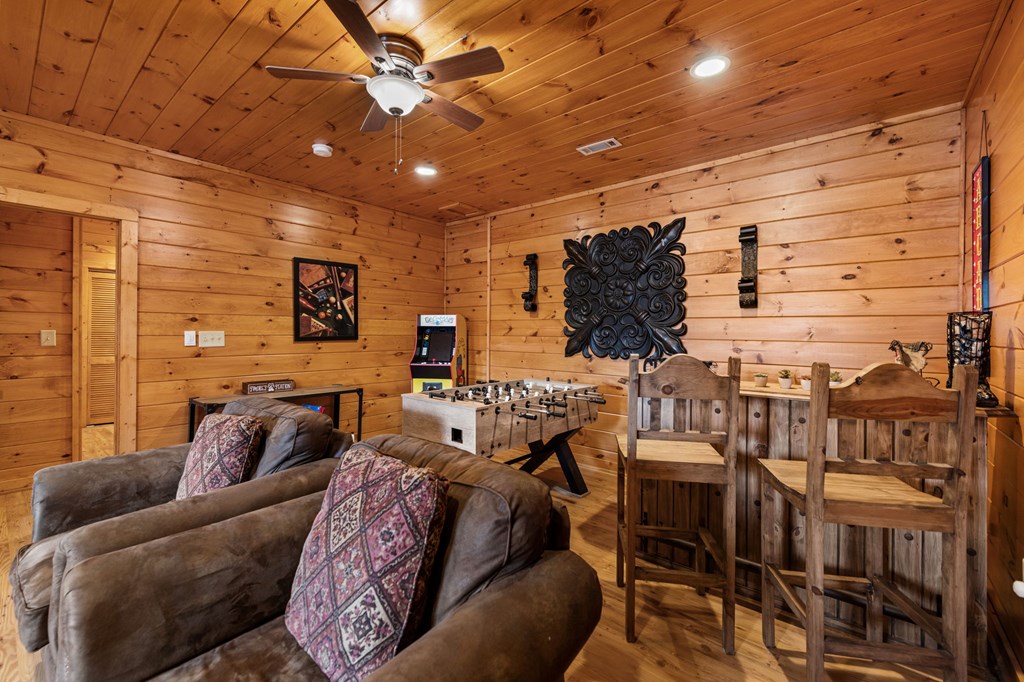 890 Brittney Drive Blue Ridge, GA 30513 - Photo 30 of 37 a living room with furniture and a flat screen tv
