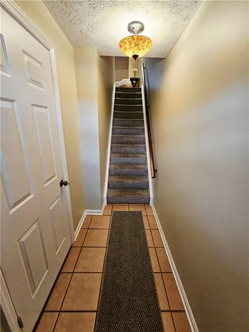 a view of entryway with a front door