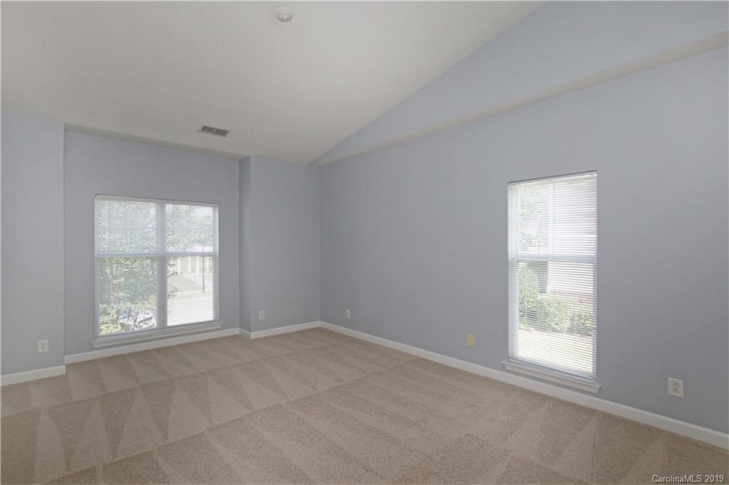 16646 Amberside Road East Cornelius, NC 28031 - Photo 11 of 29 an empty room with a window