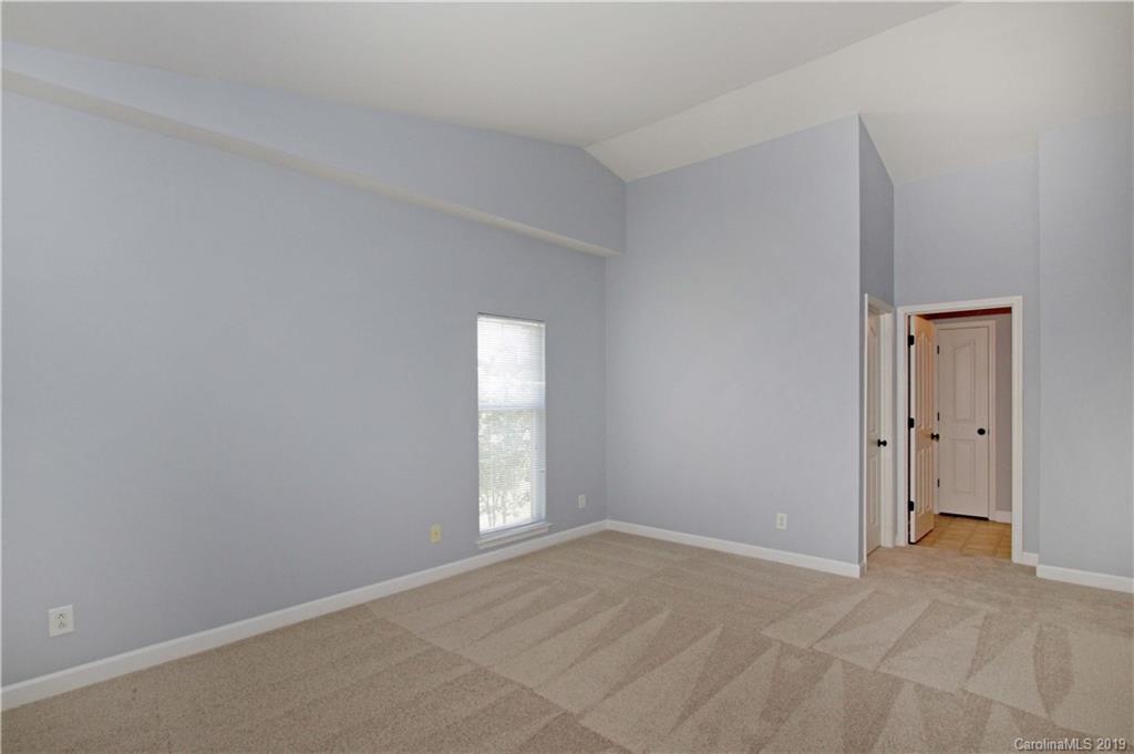 16646 Amberside Road East Cornelius, NC 28031 - Photo 12 of 29 a view of an empty room with a window