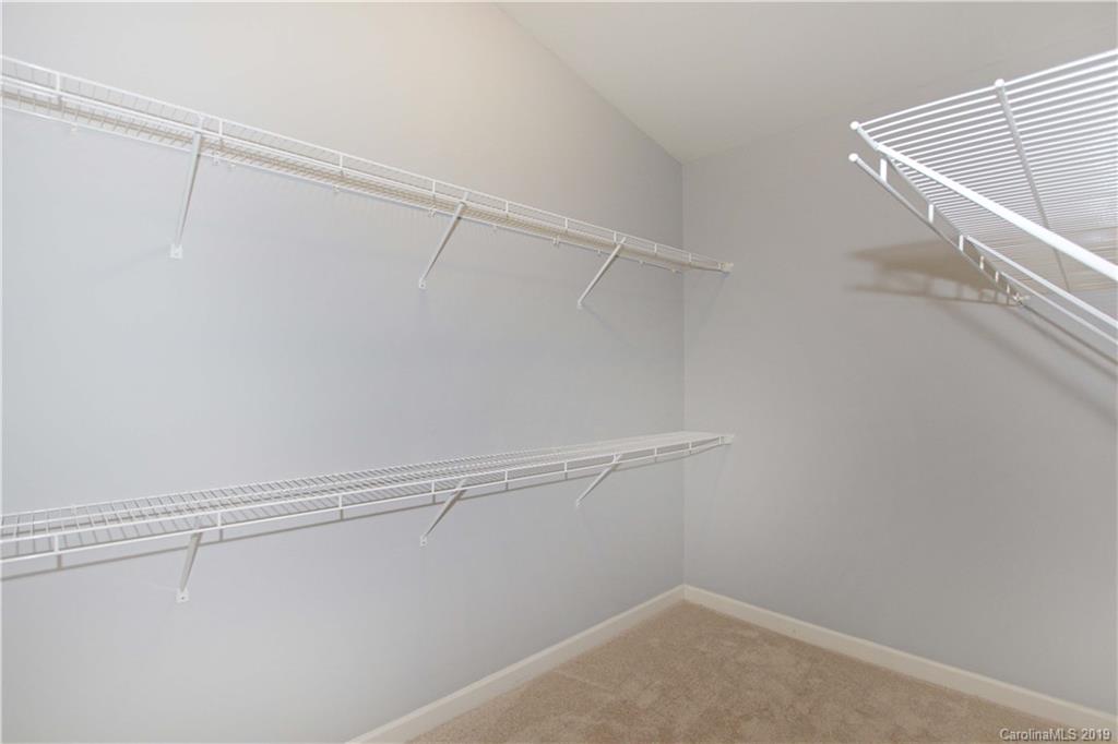 16646 Amberside Road East Cornelius, NC 28031 - Photo 13 of 29 a view of an empty walk in closet