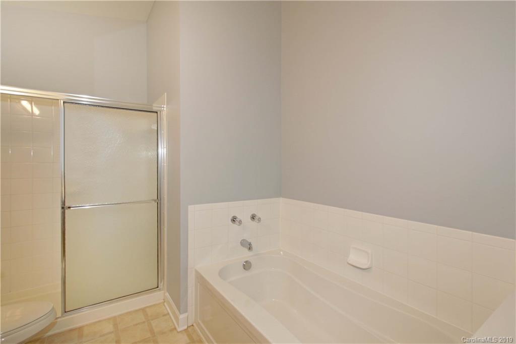 16646 Amberside Road East Cornelius, NC 28031 - Photo 15 of 29 a bathroom with a bathtub