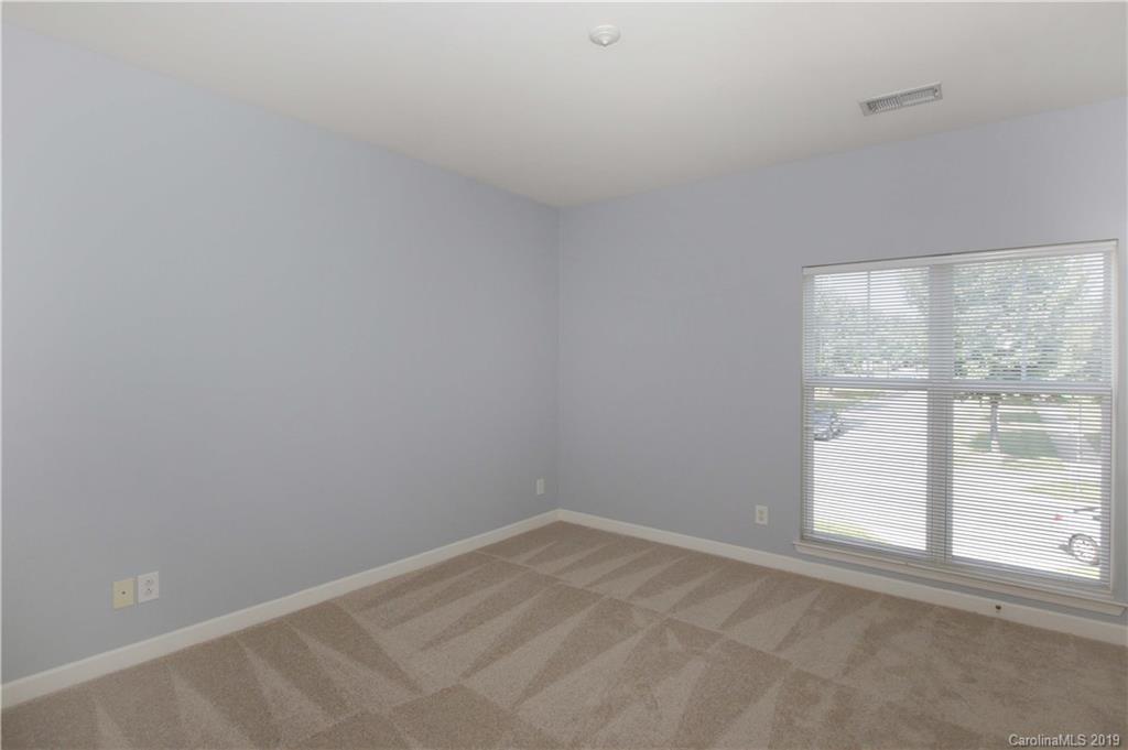 16646 Amberside Road East Cornelius, NC 28031 - Photo 16 of 29 an empty room with a window