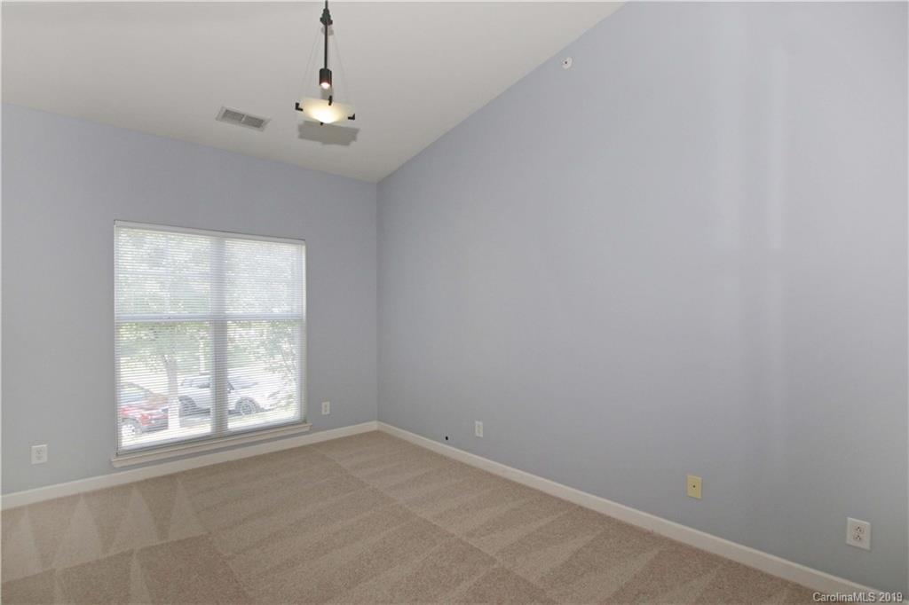16646 Amberside Road East Cornelius, NC 28031 - Photo 19 of 29 an empty room with windows and closet