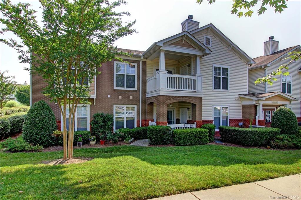 16646 Amberside Road East Cornelius, NC 28031 - Photo 24 of 29 a front view of a house with a yard