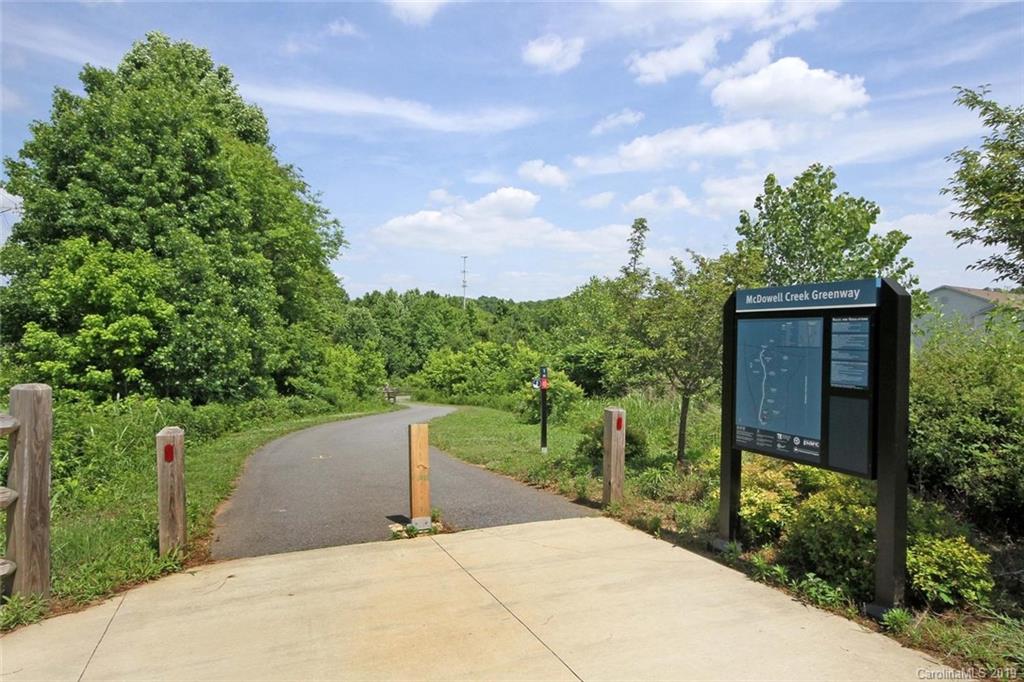 16646 Amberside Road East Cornelius, NC 28031 - Photo 27 of 29 a view of a garden with a pathway