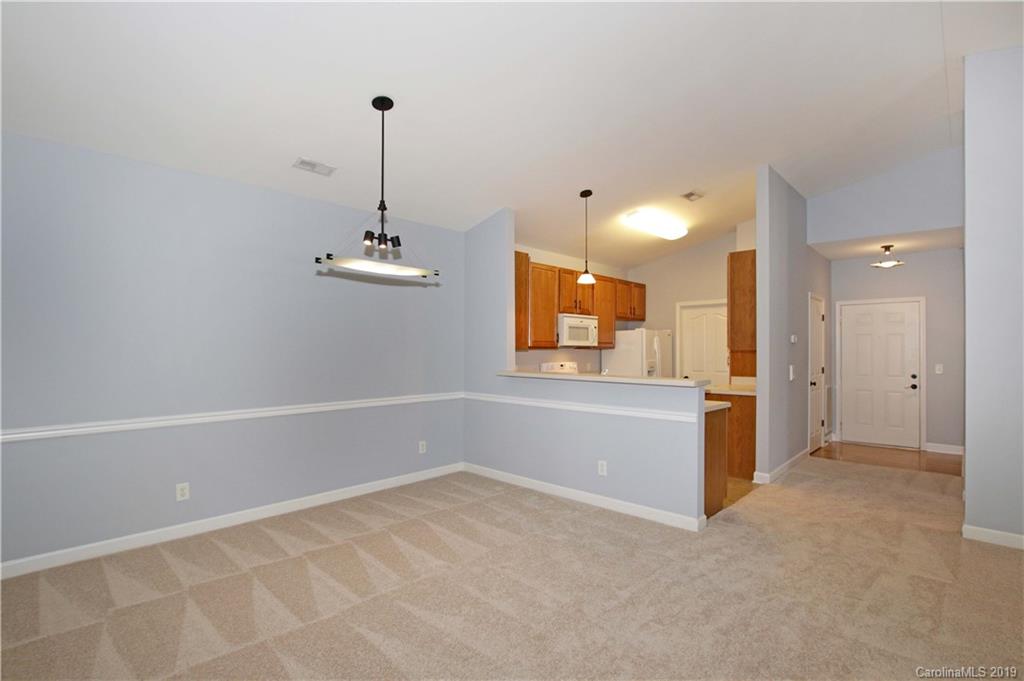 16646 Amberside Road East Cornelius, NC 28031 - Photo 5 of 29 a view of a kitchen with a sink and cabinet area