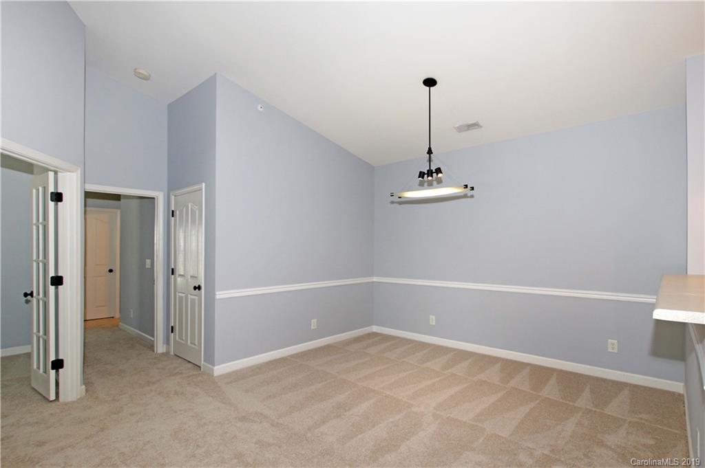 16646 Amberside Road East Cornelius, NC 28031 - Photo 10 of 29 a view of an empty room with a window