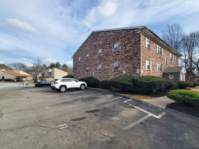 a view of car parked in front of house