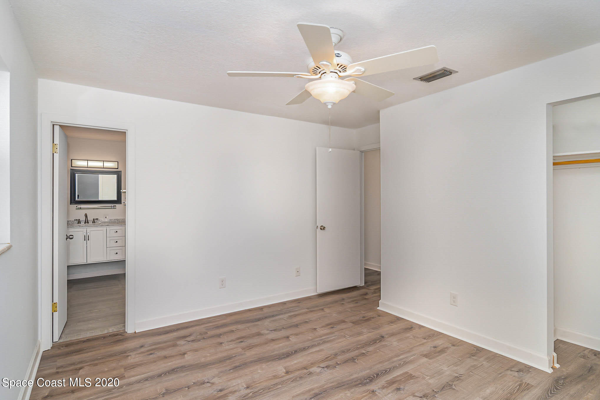 245 Monaco Road West Melbourne, FL 32904 - Photo 14 of 24 Primary Bedroom