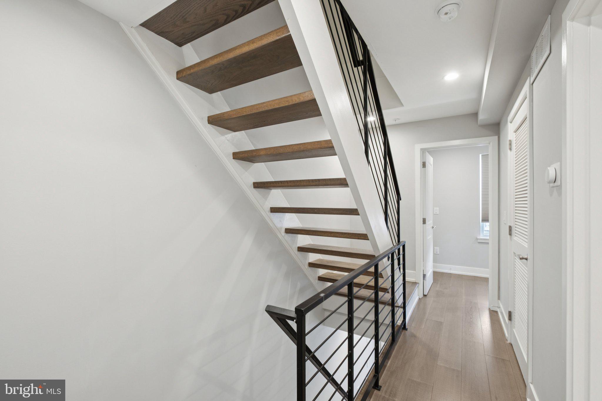 1533 South Lambert Street Philadelphia, PA 19146 - Photo 13 of 29 a view of staircase with wooden floor and white walls
