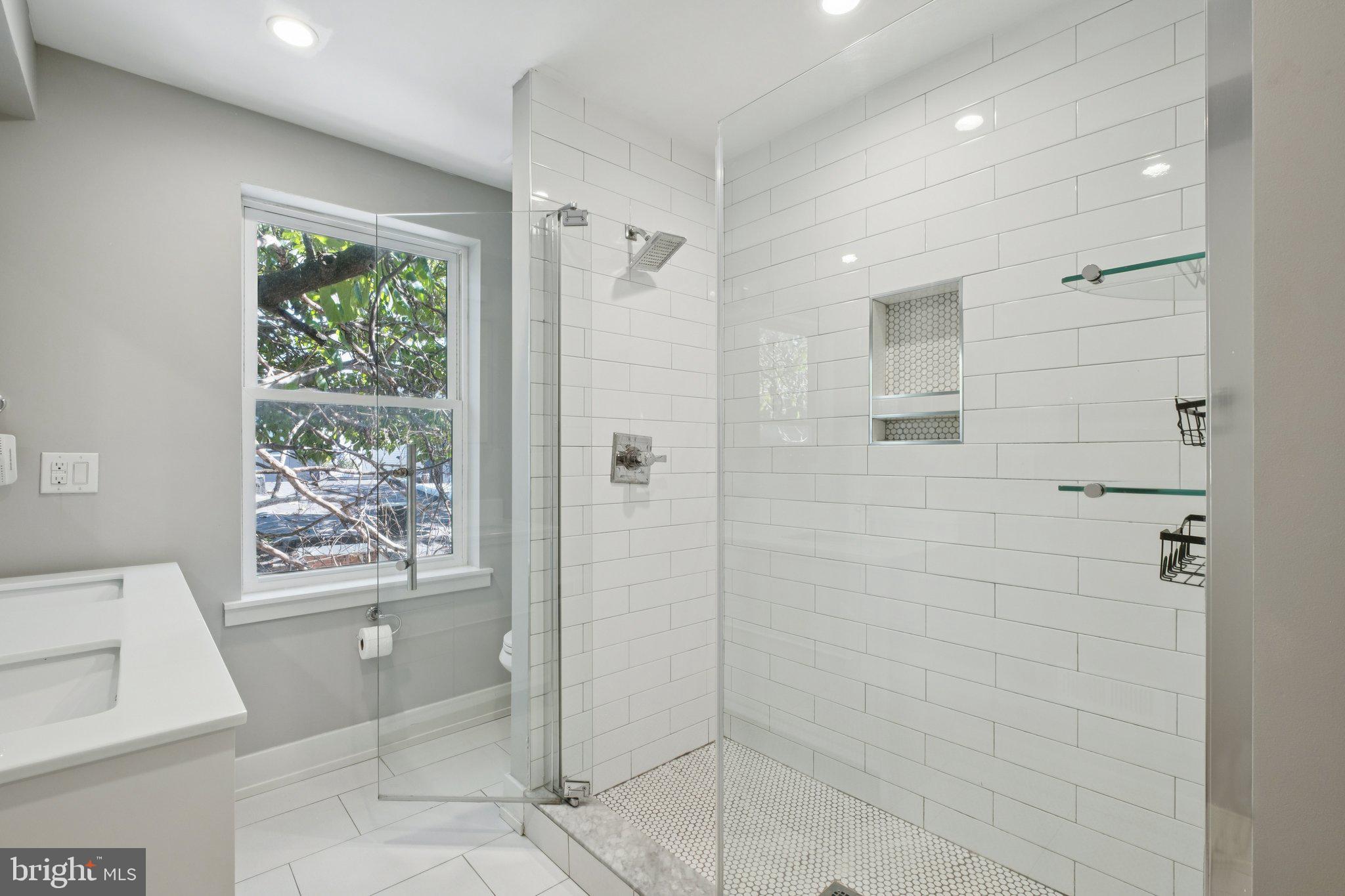 1533 South Lambert Street Philadelphia, PA 19146 - Photo 2 of 29 a bathroom with a shower and a toilet