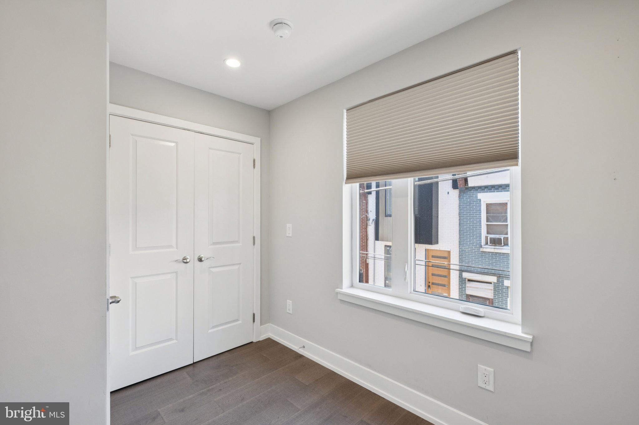 1533 South Lambert Street Philadelphia, PA 19146 - Photo 21 of 29 a view of an empty room with a window