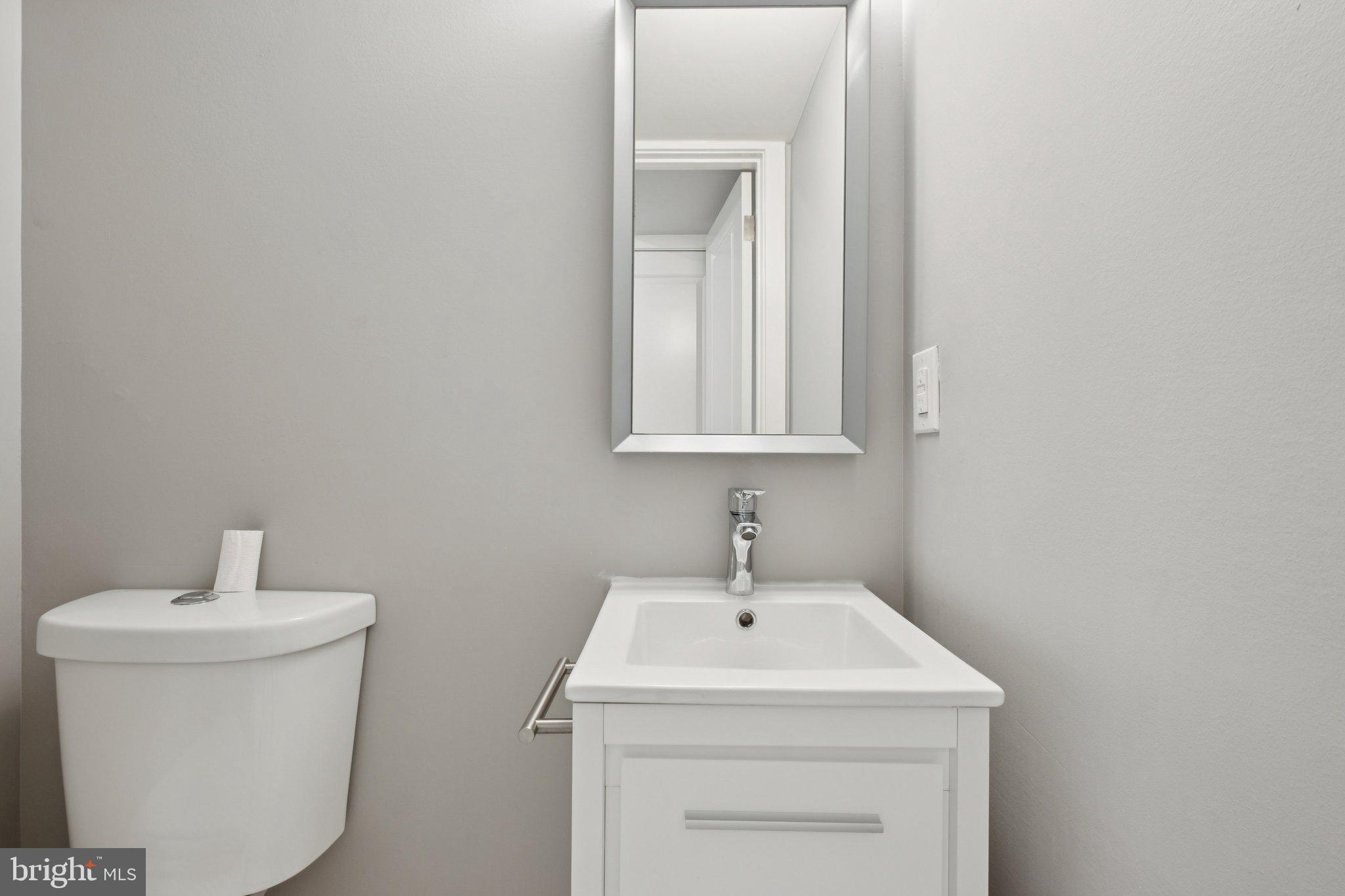 1533 South Lambert Street Philadelphia, PA 19146 - Photo 25 of 29 a bathroom with a sink and a vanity