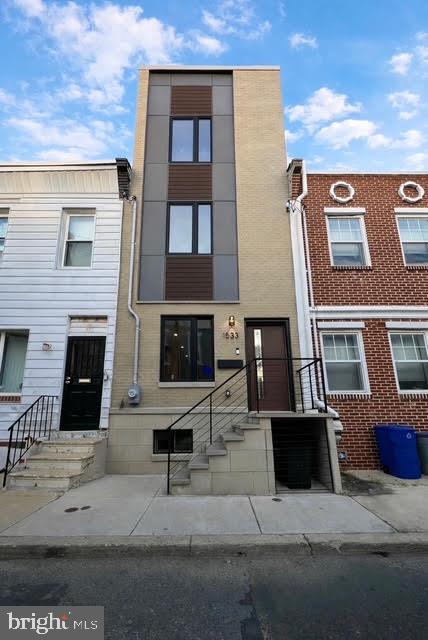 1533 South Lambert Street Philadelphia, PA 19146 - Photo 29 of 29 a view of a building with many windows