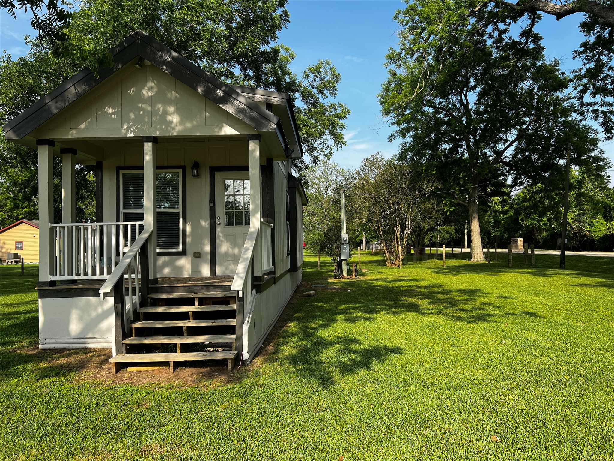 103 Pitts Road, Unit C Richmond, TX 77406 - Photo 12 of 12 a view of a house with a back yard
