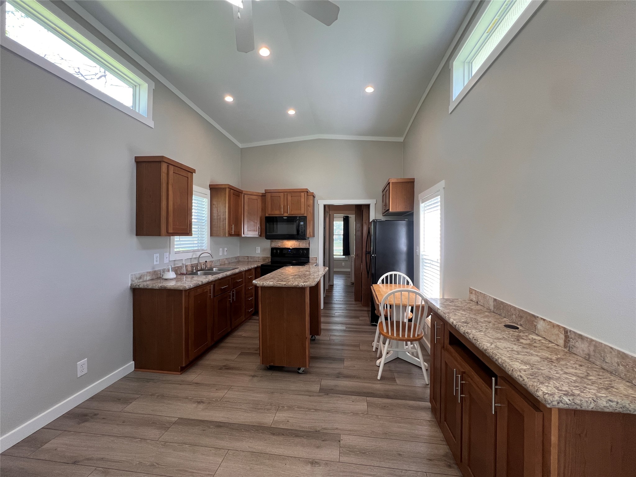 103 Pitts Road, Unit C Richmond, TX 77406 - Photo 2 of 12 a kitchen with stainless steel appliances granite countertop a stove and a refrigerator