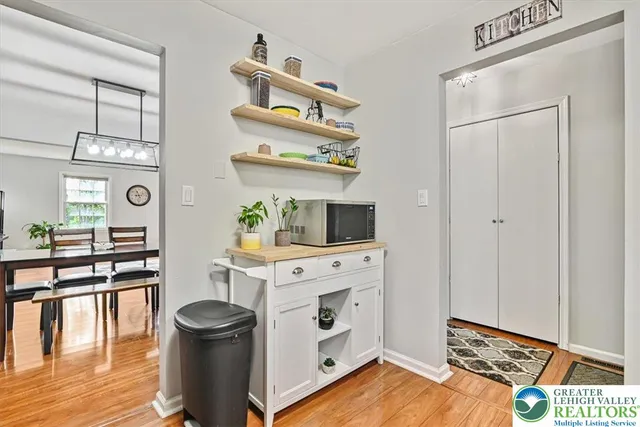 a kitchen with stainless steel appliances a stove and a refrigerator