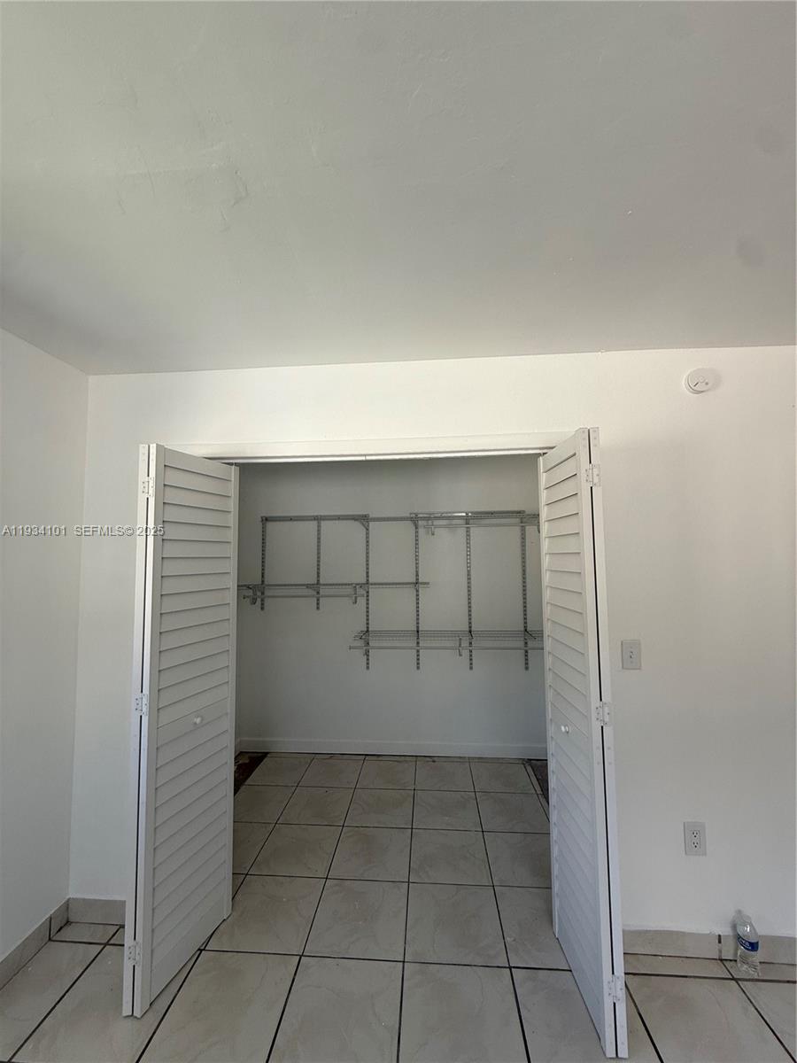 1055 Northwest 34th Avenue, Unit 1055 Miami, FL 33125 - Photo 15 of 19 a view of empty room