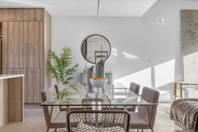 a living room with furniture and a table