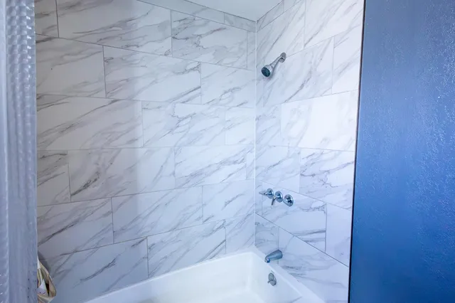 a bathroom with a bathtub