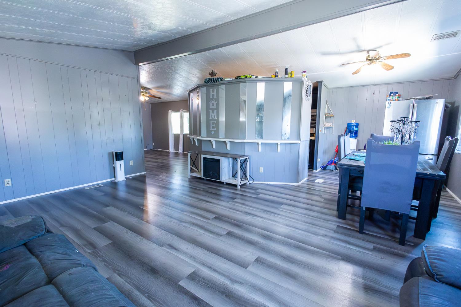 3950 Mack Road, Unit 129 Sacramento, CA 95823 - Photo 23 of 35 a view of a room with furniture and wooden floor