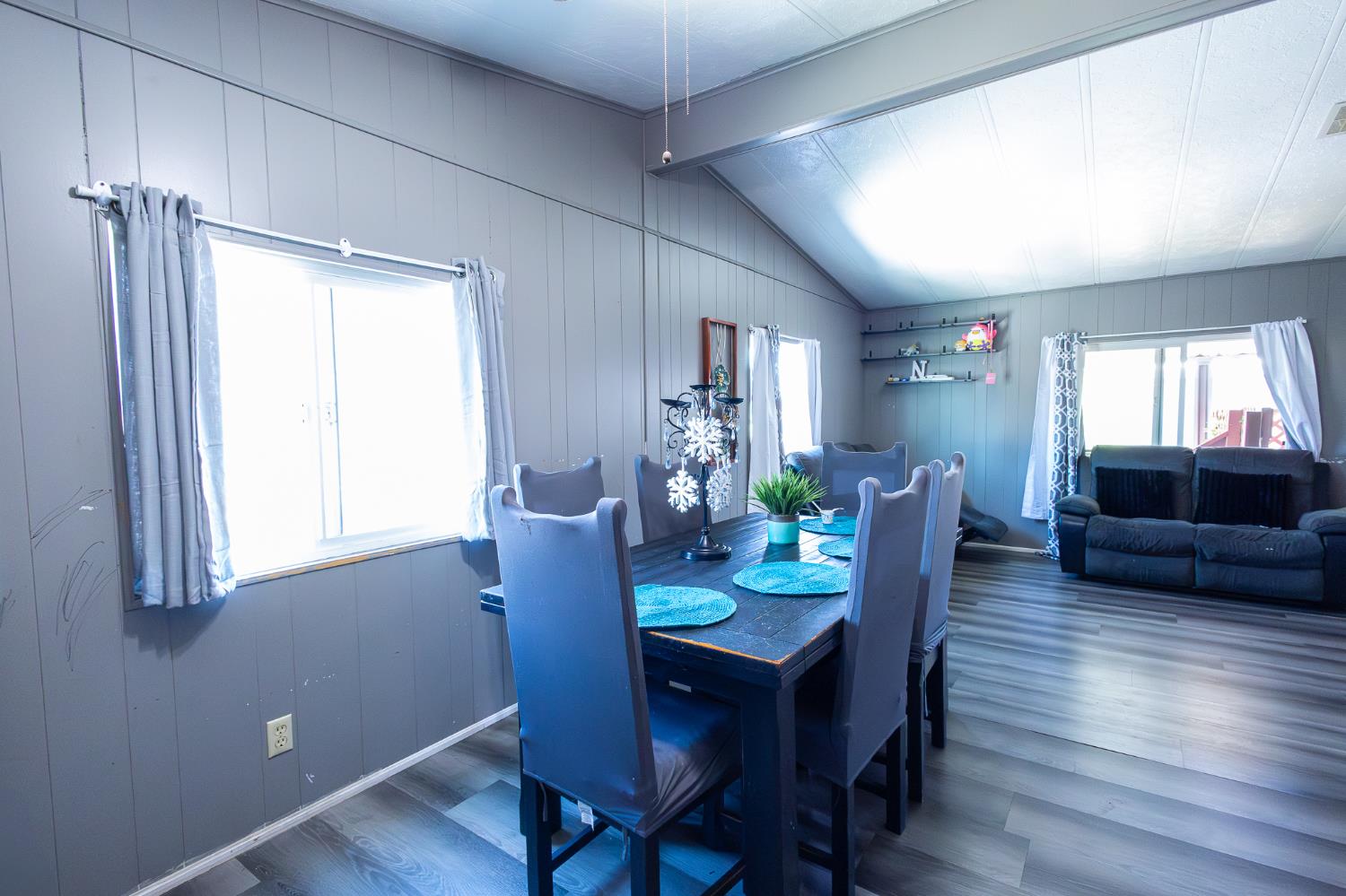 3950 Mack Road, Unit 129 Sacramento, CA 95823 - Photo 24 of 35 a view of a dining room with furniture window and wooden floor