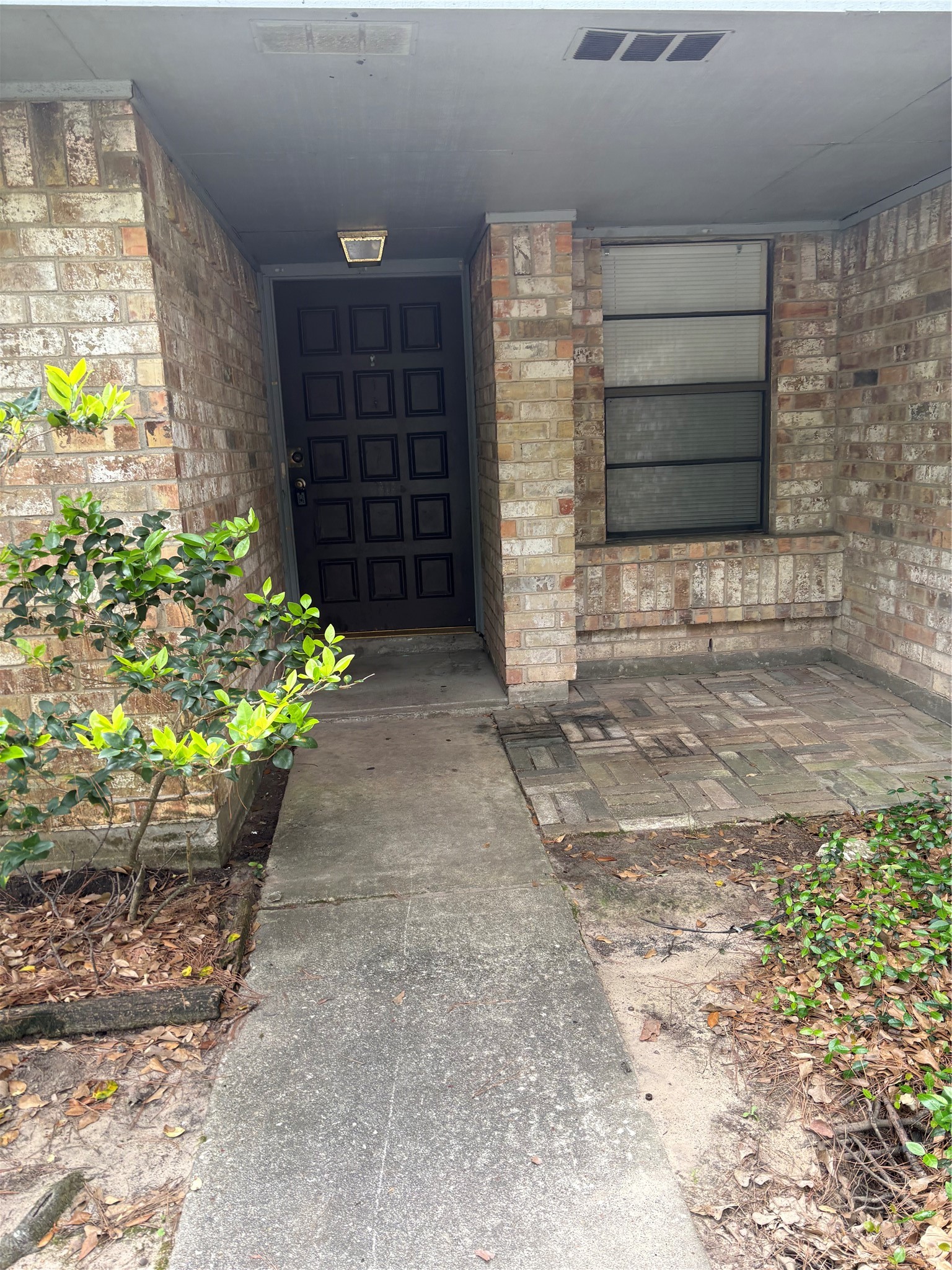 9111 Woodhouse Drive Spring, TX 77379 - Photo 7 of 7 a view of a wooden door and chair
