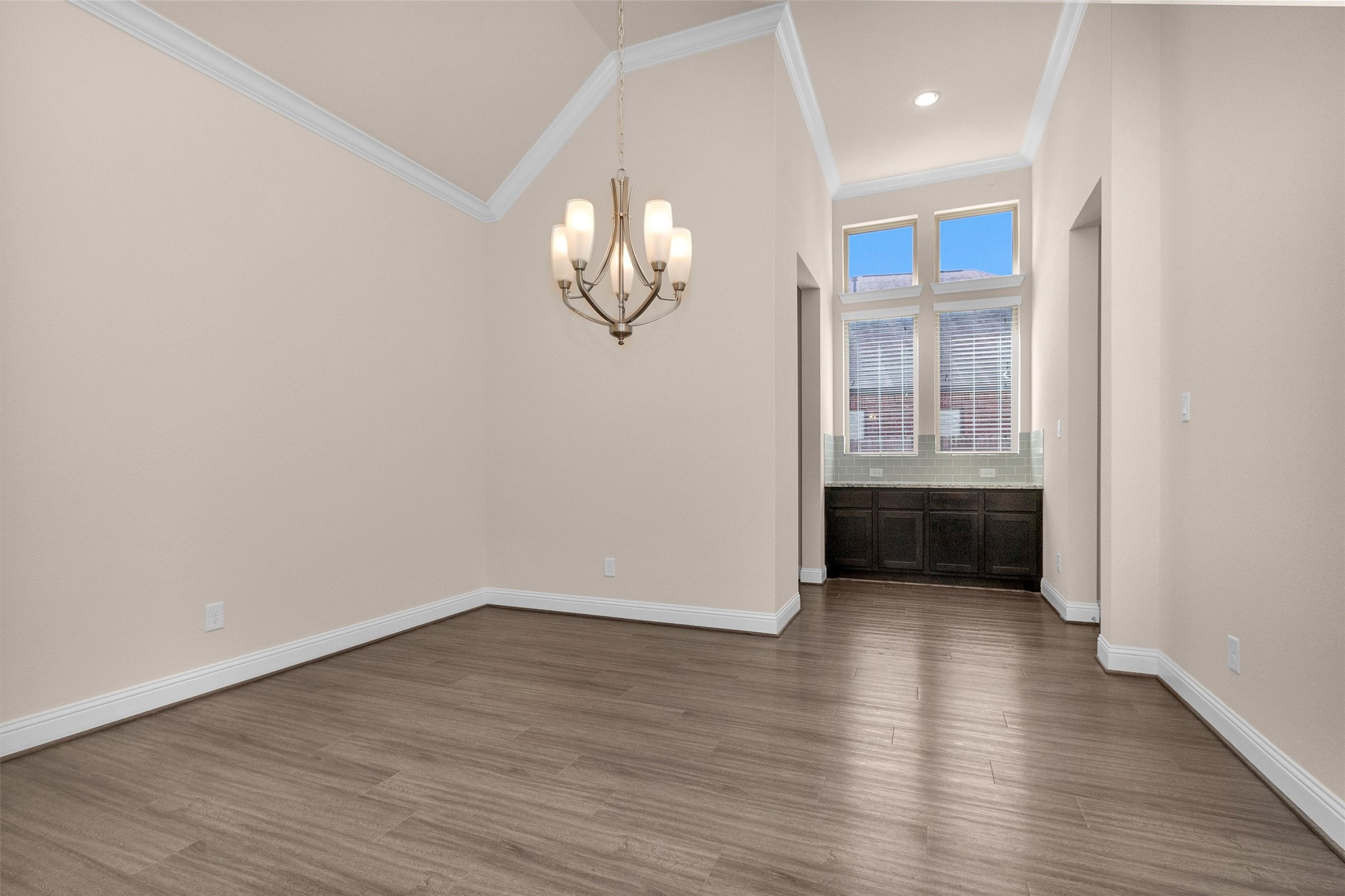 20707 Stillhaven Road Spring, TX 77379 - Photo 11 of 50 a view of a room with wooden floor and a window
