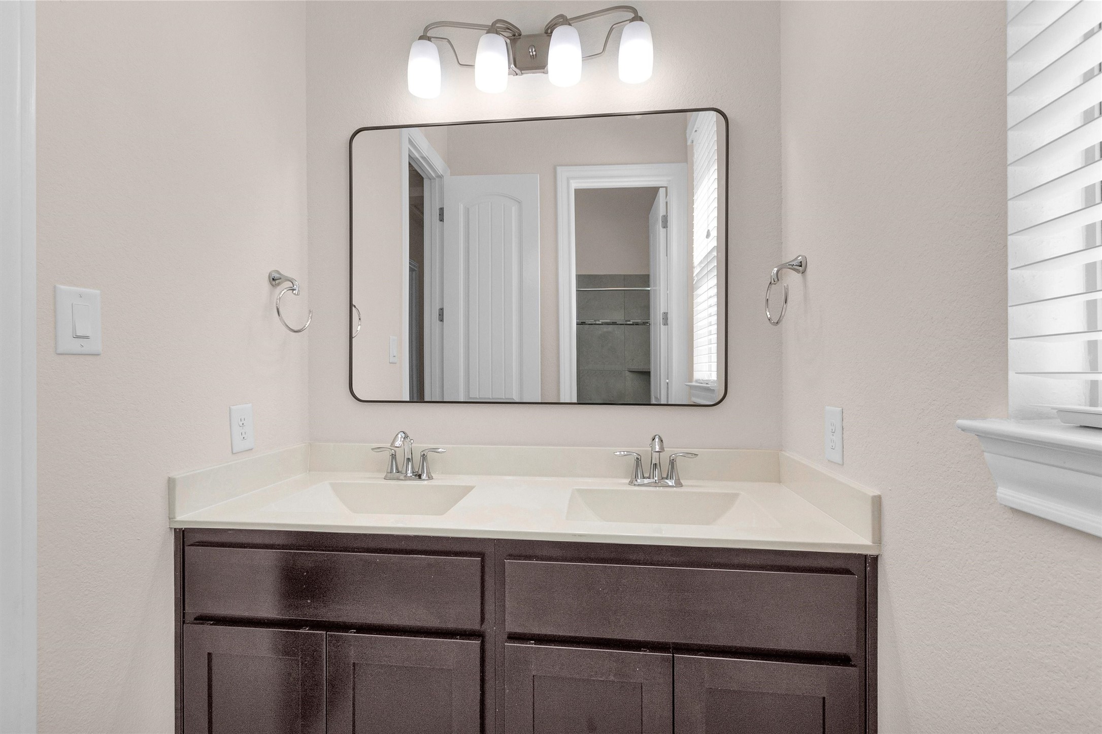 20707 Stillhaven Road Spring, TX 77379 - Photo 34 of 50 a bathroom with a sink and a mirror