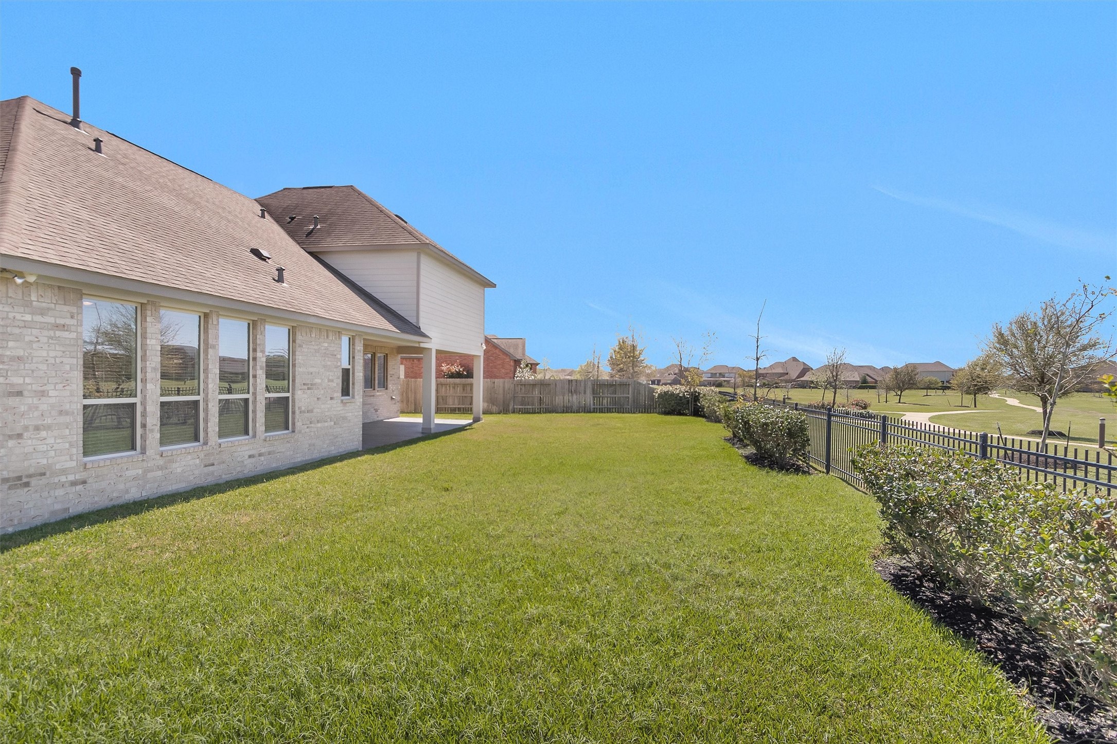20707 Stillhaven Road Spring, TX 77379 - Photo 44 of 50 a view of a house with pool and a yard