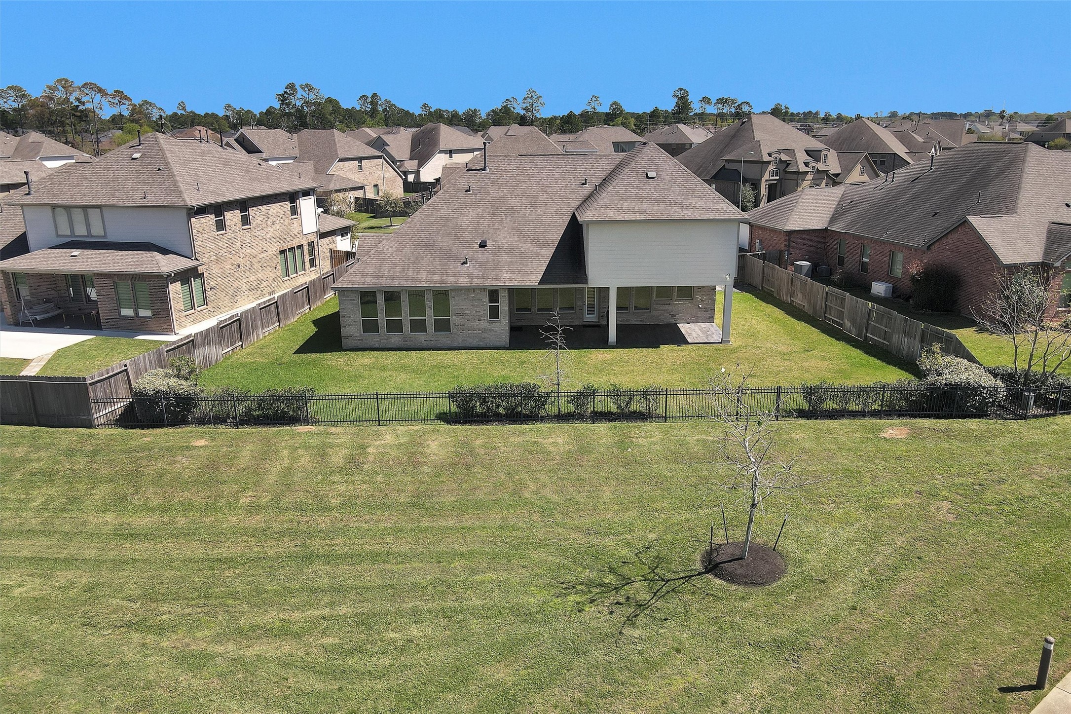 20707 Stillhaven Road Spring, TX 77379 - Photo 45 of 50 an aerial view of residential houses with outdoor space and swimming pool