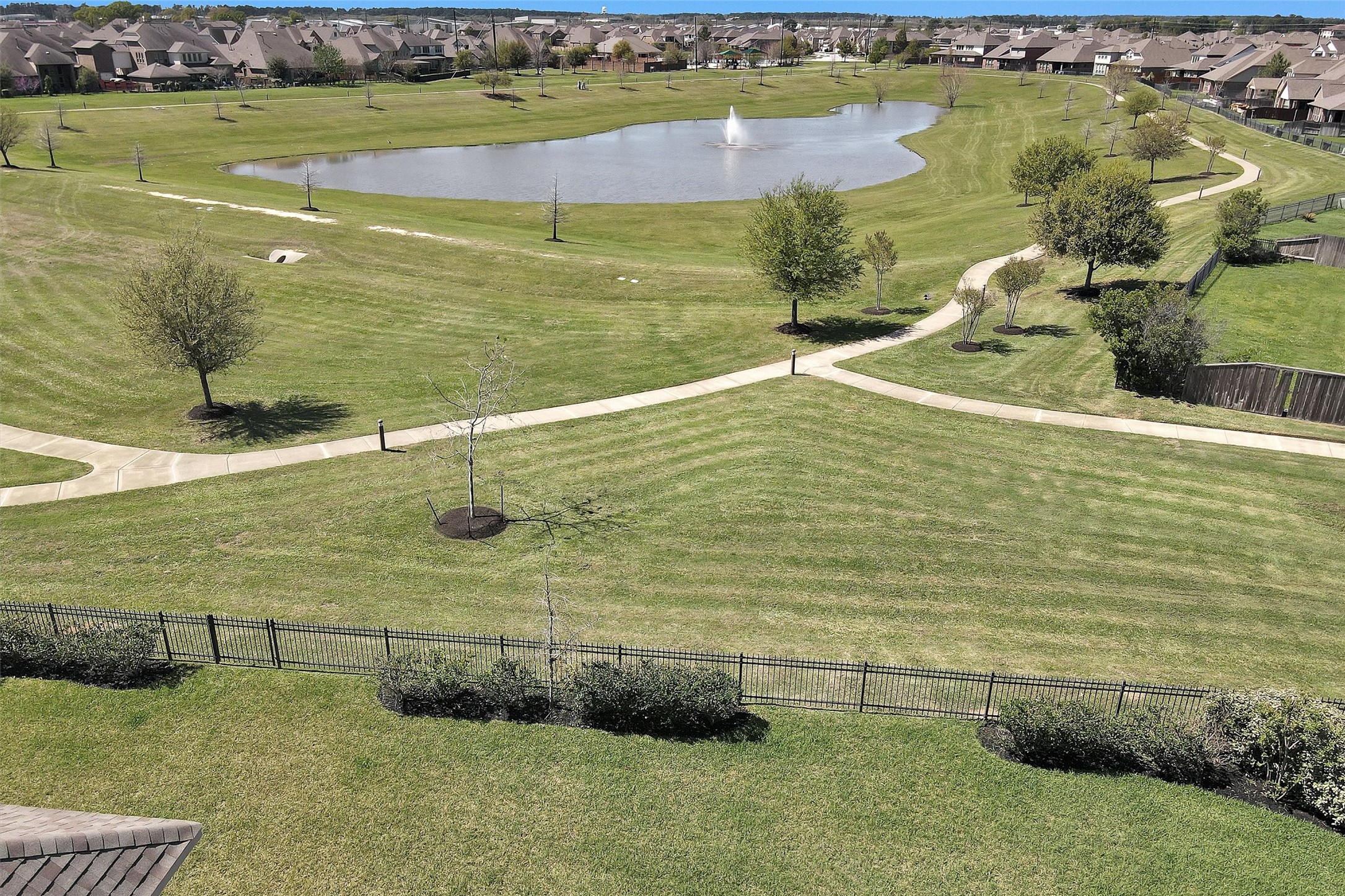20707 Stillhaven Road Spring, TX 77379 - Photo 47 of 50 a view of a lake with a beach