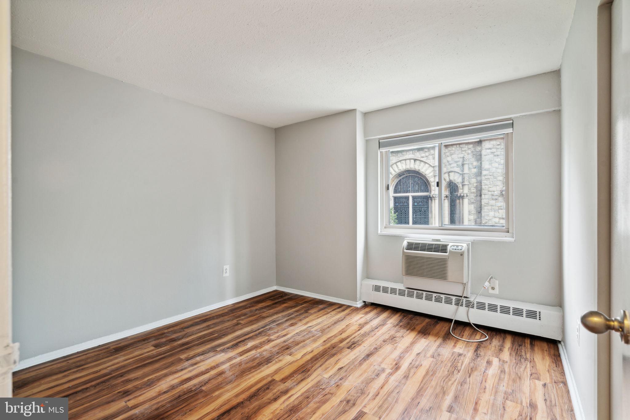 2101 Chestnut Street, Unit 415A Philadelphia, PA 19103 - Photo 10 of 20 a view of empty room with washer and dryer