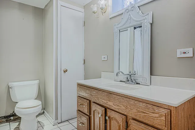 a bathroom with a bathtub toilet and a shower
