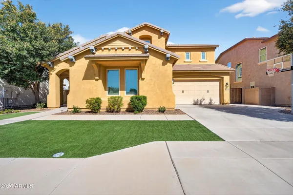 front view of a house with a yard