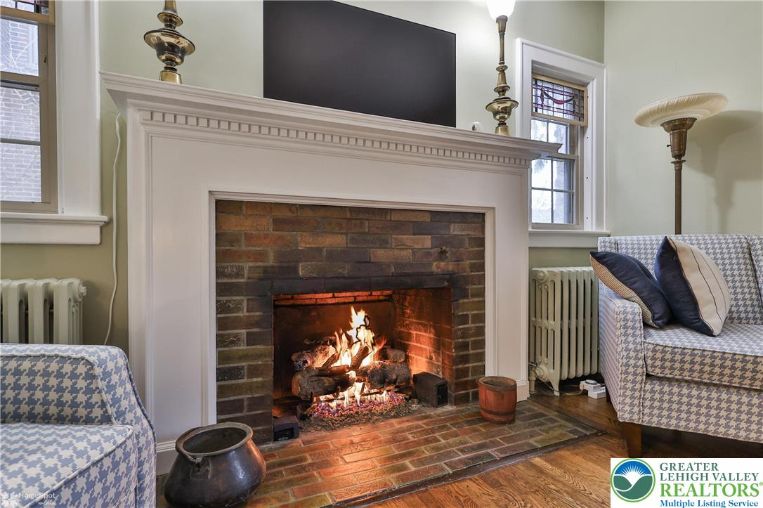 1808 Sycamore Street Bethlehem, PA 18017 - Photo 13 of 55 a living room with furniture and a fireplace