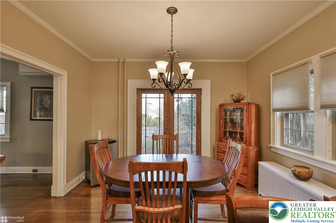 1808 Sycamore Street Bethlehem, PA 18017 - Photo 15 of 55 a dining room with furniture a chandelier and wooden floor