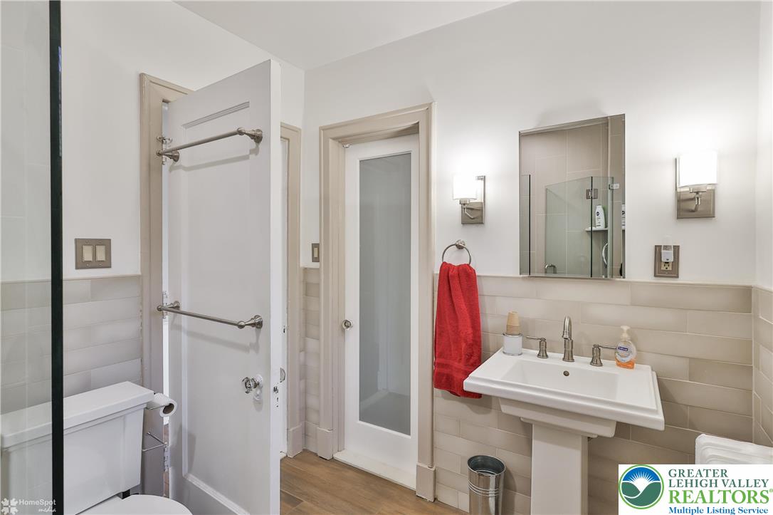 1808 Sycamore Street Bethlehem, PA 18017 - Photo 26 of 55 a bathroom with a sink and a mirror