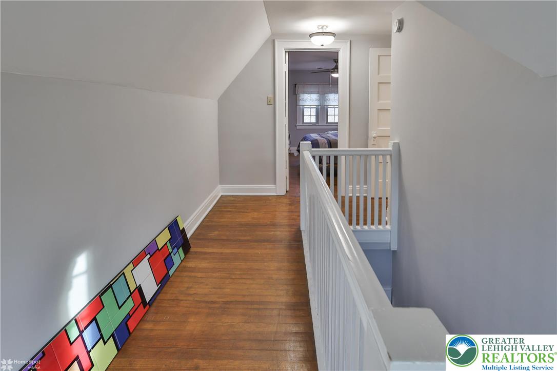 1808 Sycamore Street Bethlehem, PA 18017 - Photo 33 of 55 a hallway with wooden floor and staircase