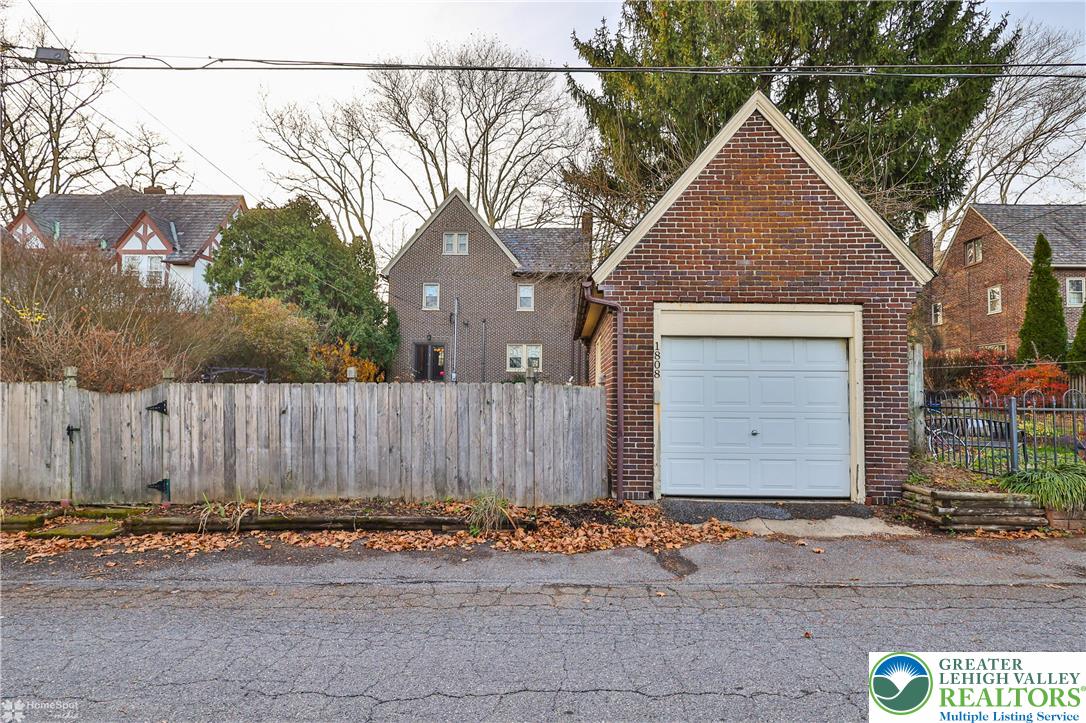 1808 Sycamore Street Bethlehem, PA 18017 - Photo 46 of 55 a front view of a house with a yard and garage