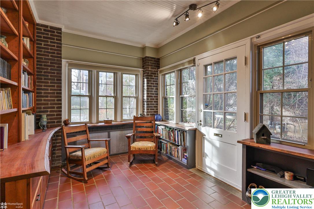 1808 Sycamore Street Bethlehem, PA 18017 - Photo 5 of 55 a living room filled with furniture and floor to ceiling windows