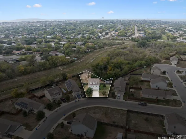 an aerial view of multiple house
