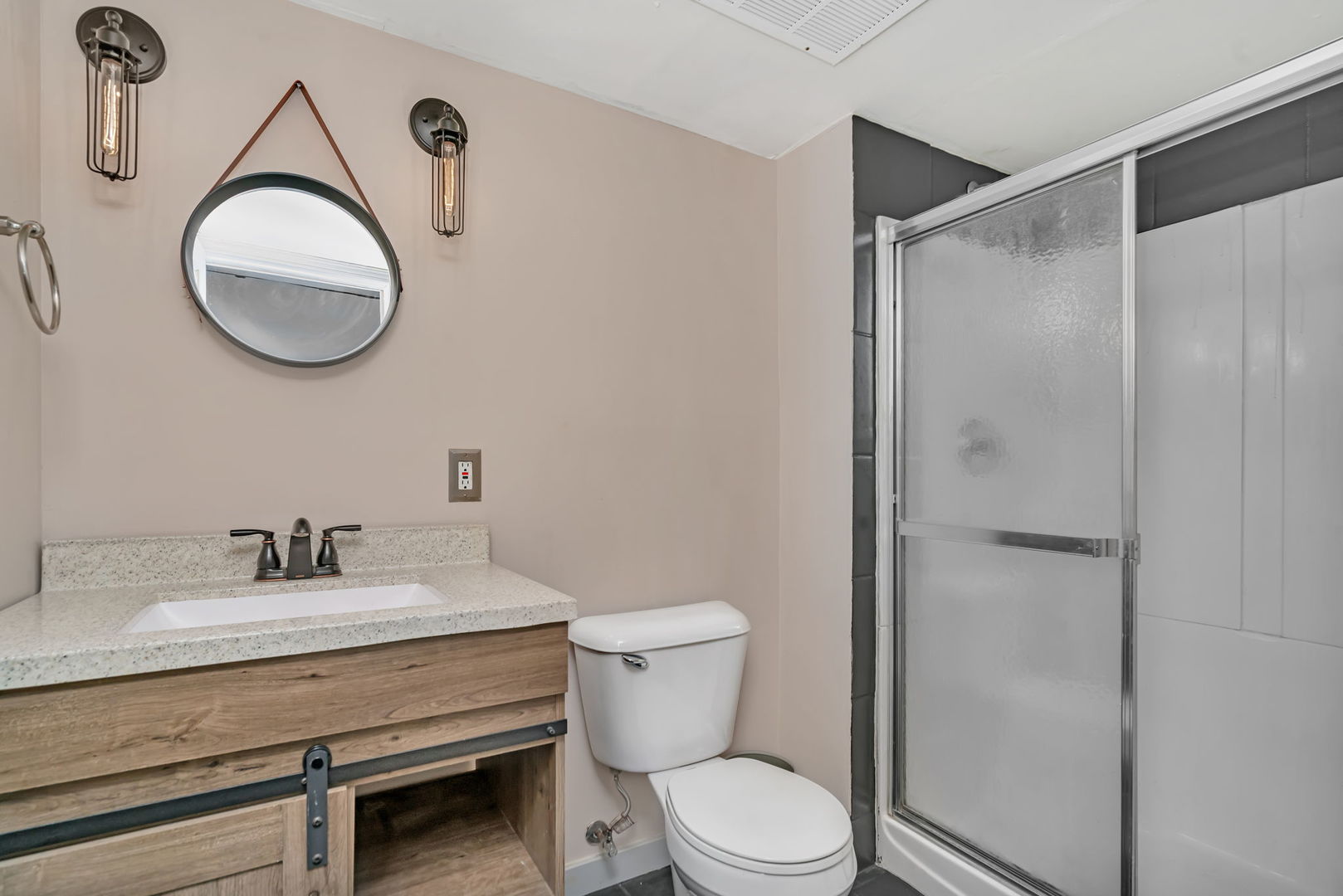 1605 Heritage Pointe Court Plainfield, IL 60586 - Photo 14 of 21 a bathroom with a toilet sink vanity and mirror